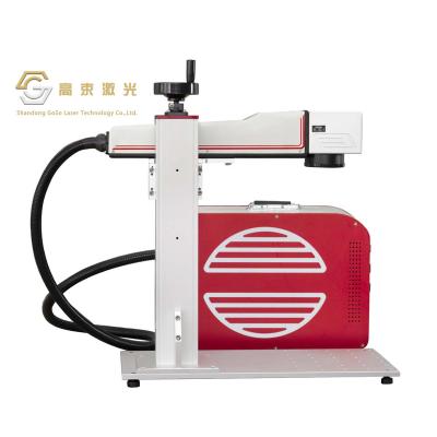 China Optional 20W 30W 50W Raycus Fiber Laser Marker Gold Steel Engraving Fiber Laser Marking Automated Loading Rotary Cutting Machine For Metal for sale