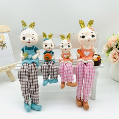 China China cute cartoon resin rabbit a family of four crafts home furnishings resin rabbit leg cloth couple gift for sale