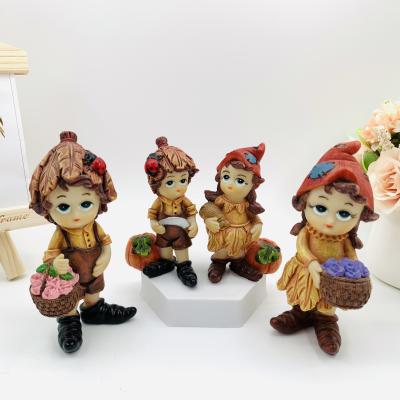 China Creative China Resin Garden Leaves Elves Four Position Family Small Brush Pot Elves Couples Resin Crafts Home Furniture Gift for sale