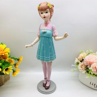 China China creative fashionable blue flowered skirt with beautiful garland girl resin opens home furnishing gift souvenir for sale