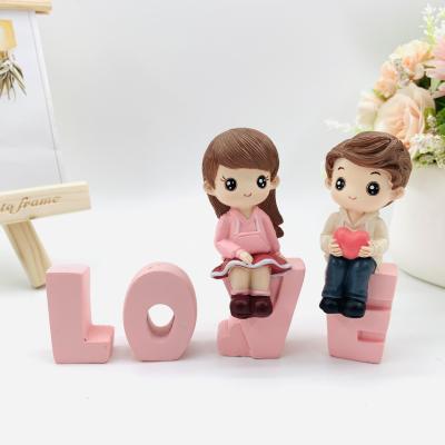 China China hot sale wedding gifts for guests furnishing articles resin crafts cartoon love couples cake ornaments and car ornaments for sale