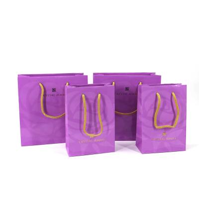 China Recycled Materials Sale Customize Fashionable Thank You Apparel Shopping Gift Packaging Paper Bag for sale