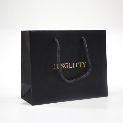 China Materials recycled paper bag with 40% pcw luxury paper customized fashionable paper bag for shopping for sale