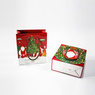 China Eco Friendly Recycled Materials Mini Size Christmas Packaging Gift Shopping Full Color Paper Bag With Handle for sale