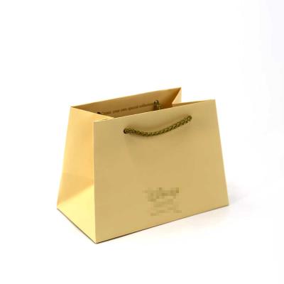 China Recycled Materials Top Sell Custom Gold Printed Packaging Clothing Cosmetics Jewelry Gift Shopping Paper Bags for sale