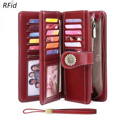 China RFID Fashion Wallet 100% Larger Capacity Real Genuine Leather Purses And Wristlet Handbags Ladies Long Purse Clutch Wallets For Women for sale