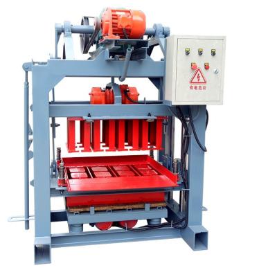 China Widely Used Hollow Buliding Building Concrete Block Brick Making Machine Price In USA Zambia Ghana Kenya for sale