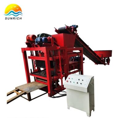 China Buliding Construction QTJ4-28 Hollow Interlocking Concrete Block Making Machine For Construction for sale