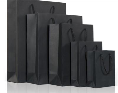 China Recycled Materials Black Luxury Paper Shopping Bag Custom Gift Wrapping Paper Wholesale Custom Packaging for sale