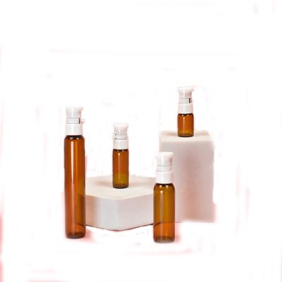 China Personal Care Wholesale 1ml 3ml 5ml 10ml Volume Glass Pull Out Bottles Serum Glass Bottle for sale