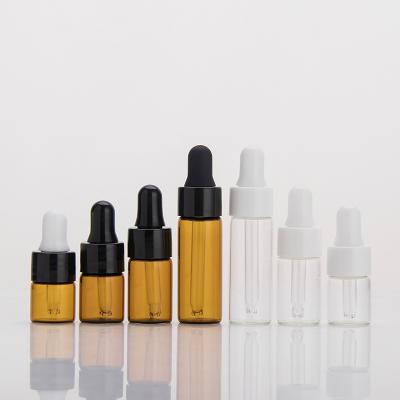 China Free Sample 1ml 2ml 3ml 5ml Personal Care Clear Amber Glass Sample Dropper Bottle Cosmetic Oil Sample Vials With Gold Cap And Blank for sale