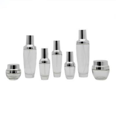 China High Quality Black Glass Cosmetic Empty Pump Bottle Set Small Skin Care Product Bottle Spray Head Cream Bottle for sale