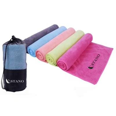 China QUICK DRY high quality custom logo fitness towel microfiber sports gather gym towel with pocket for sale