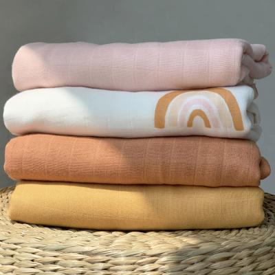 China Solid Color Anti-static Bamboo Wholesale Cotton Blankets Super Soft 100% Muslin Muslin Fabric Wrap Baby Blanket for sale