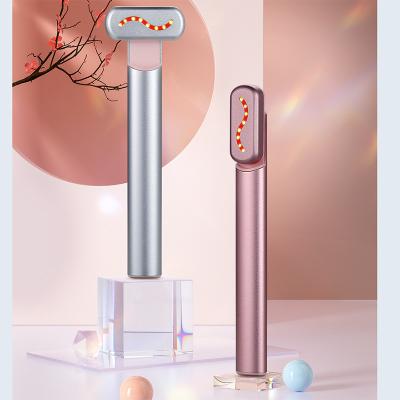 China Skin Tightening Facial Massager Red Color Light Heated Vibration Eye Care Lifting Beauty Device Electric Eye Massager for sale