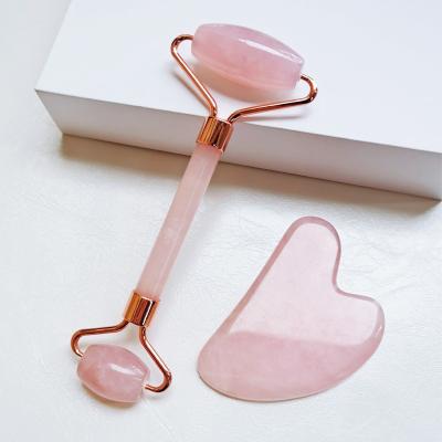 China Skin Rejuvenation Pink Crystal roller massager non-Jade acrylic face Roller massage facial beauty shaving beauty massage stick for sale