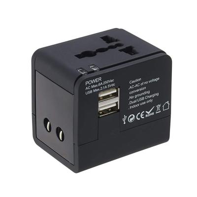 China Universal Power Adapter 2 Safty Travel USB Ports Power Charging Adapter for sale