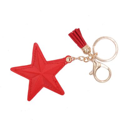 China High Quality Tassel Leather Wholesale Star Pentagon Bag Mobile Phone Accessories Party Gift Main Logo Keychain for sale