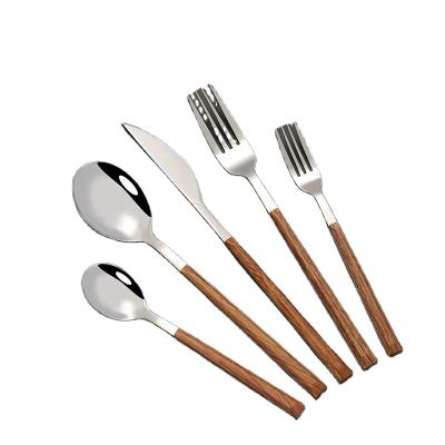 China New Viable Amazon Grain Flange Handle Imitation Wood Cutlery Set Stainless Steel Western Steak Cutlery for sale