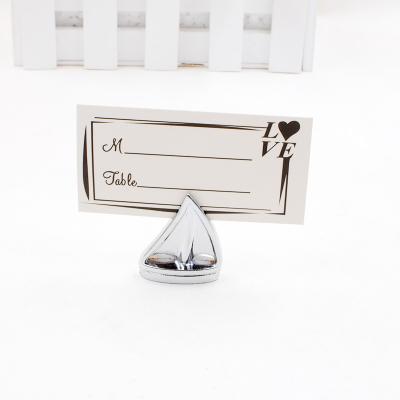 China Europe Manufacturers Creative Geometric Wedding Table Clip Sailboat Seat Clip Wedding Supplies Seat Alloy Business Card Holder for sale