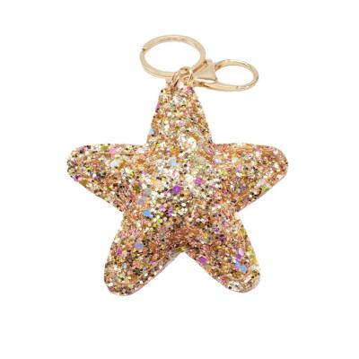 China Shiny PU Leather Five Pointed Star Powder Shiny Star Key Chain Stationery Decoration Gold Luggage Promotion Gift Chain Pendant Clothes Pendant Decoration for sale