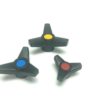 China Wholesale contemporary high quality environmental protection black wing factory direct sale plastic triangle arrow button straight-grained for sale