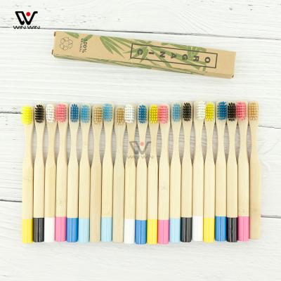 China Eco Friendly Wooden Handle Multi Color Bristle Brush Kids Toothbrush for sale