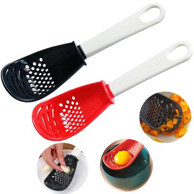 China Viable Multifunctional Spoon Ginger Garlic Grinding Kitchen Tool Potato Grinder Food Grade Filter Cooking Plastic Spoon for sale