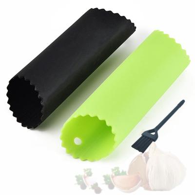 China Stored Easy Roller Peeling Odorless Useful Tube Kitchen Tool Instrument Silicone Garlic Peeler for sale