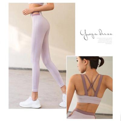 China Seamless Leggings And Antibacterial Sports Bra Set Clothes Bulk Fitness Yoga Woman for sale