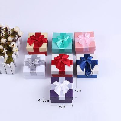 China Recycled Materials Shape Cardboard Jewelry Box For Ring Necklace Earring Set Wholesale Packaging With Bow for sale