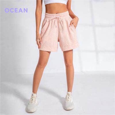 China Breathable Loose Waisted Gym Drawstring Cotton Jacquard Sportswear Women Running Shorts With Pockets for sale