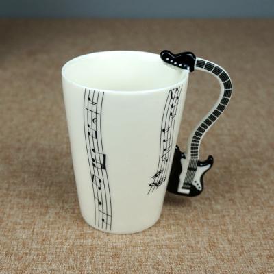 China 7 Ounce Tarpul Acoustic Guitar Music Notes Disposable Ceramic Coffee Cup Tea Cup for sale