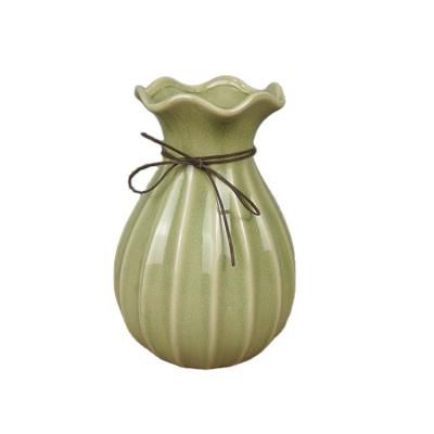 China Minimalist Classic Green Tarpul Bottle Top Irregular Ceramic Vase Hydroponic Container for sale