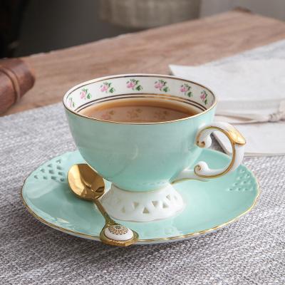 China Exquisite And Luxurious Viable In Afternoon Tea Set Hollow Bone China Coffee Cups Saucers With Spoon for sale