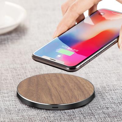 China Wholesale Portable Universal Qi Charger Pad 10W Fast Charging Log Wireless Fast Charging Charger For Mobile Phones for sale