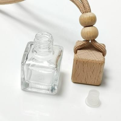 China Eco-friendly Recyclable Luxury Glass Perfume Diffuser Wholesale Car Containers Bottle With Lid for sale