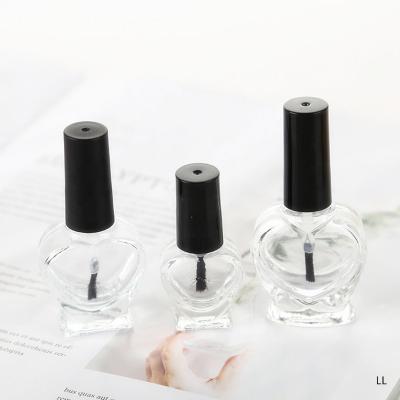 China Eco-friendly Square Shape Recyclable Heart Shape Clear Glass Empty Nail Polish Bottle 15ml With Big Brush for sale