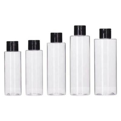 China Cosmetic 100ml Plastic Bath Oil Bottle With Lid Flip Top Cosmetic Bottle for sale