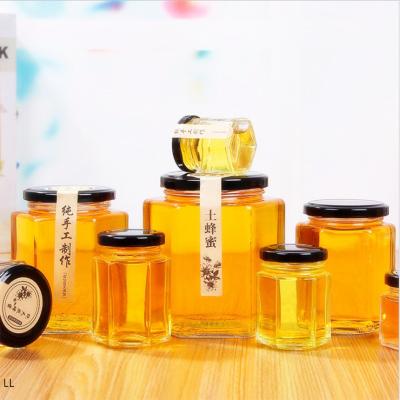 China Mini Fancy Eco - Friendly / Stocked Food Glass Jam Jars With Black Metal Lids 45ml 85ml 100ml for sale