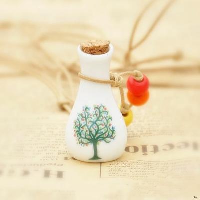 China Personal Care 8ml Polymer Clay Hanging Round Car Perfume Bottle for sale