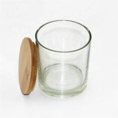 China Viable Customized Wholesale Clear Transparent Candle Glass Jars With Bamboo Lid Glass Jars For Candles for sale