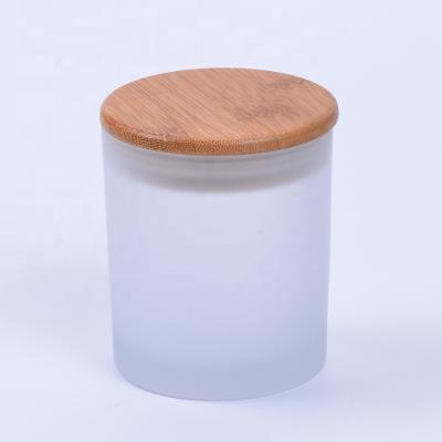 China Wholesale Frosted Glass Empty Candle Jar Luxury Round Bamboo Cover Candle Jar Container Lid for sale