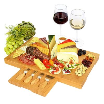 China Sustainable Charcuterie Platter and Cheese Tray Unique Serving Cut Bamboo Board for sale