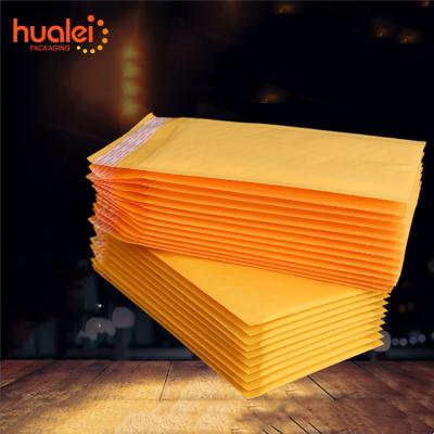 China Garment Clothing Factory Customized Yellow Mailing Envelope Polyethylene Kraft Paper Bubble Bag Waterproof Messenger Bag With Foam for sale