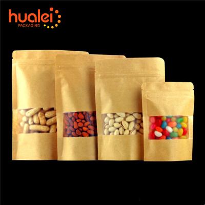 China Custom Recyclable Kraft Paper Holder Up Pouch Ziplock Bags With Clear Window Seed Food Packaging Self Sealing Bag for sale