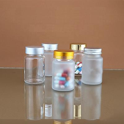 China Bill 60ml medicine glass bottle with lid, airtight bottle for capsule cordyceps health care products packaging for sale