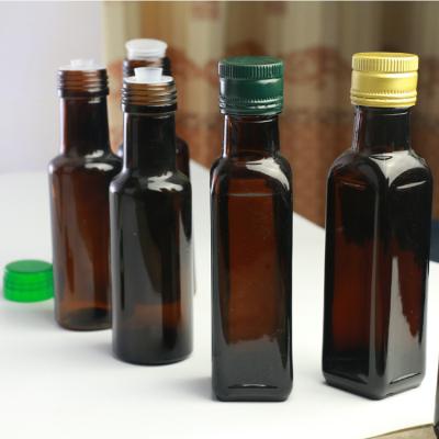 China Wholesale Oil Thickened 100ml Glass Bottle For Sesame Seal Sesame Oil Containing Cover for sale