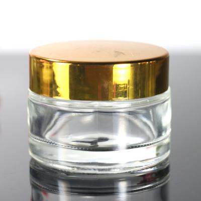 China Personal Care Empty Transparent Glass Eye Cream Jar 50g Cans For Skin Cream for sale