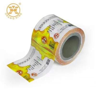 China PET/Al/PE Honey Packaging Laminate Poly Film Aluminium Foil Plastic Film Honey Sachet Roll Film for sale